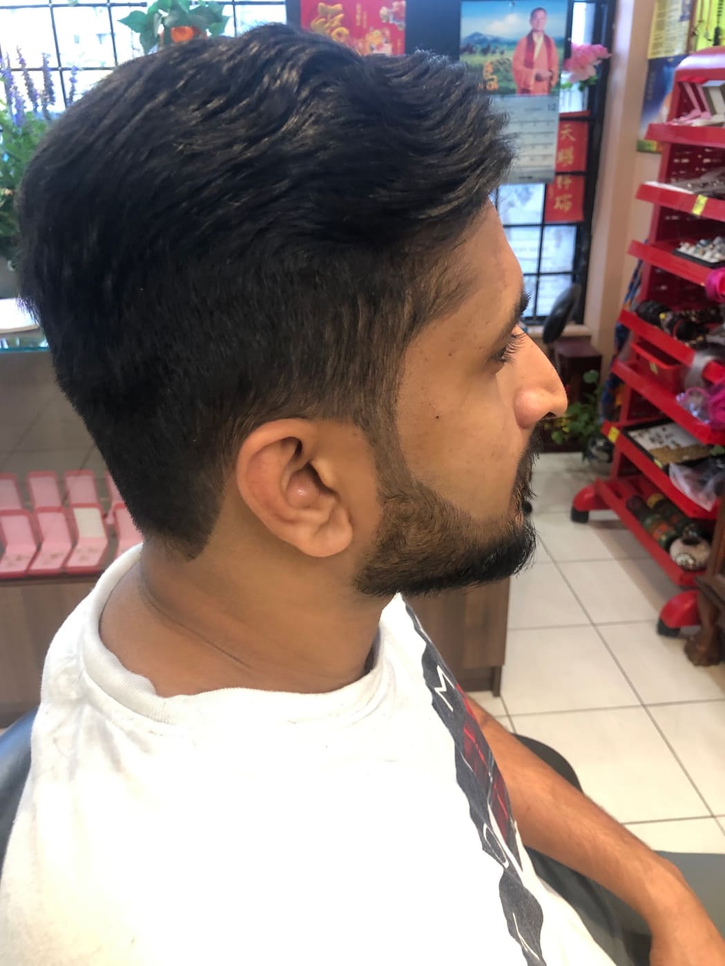 Pompadour with skin fade, side profile