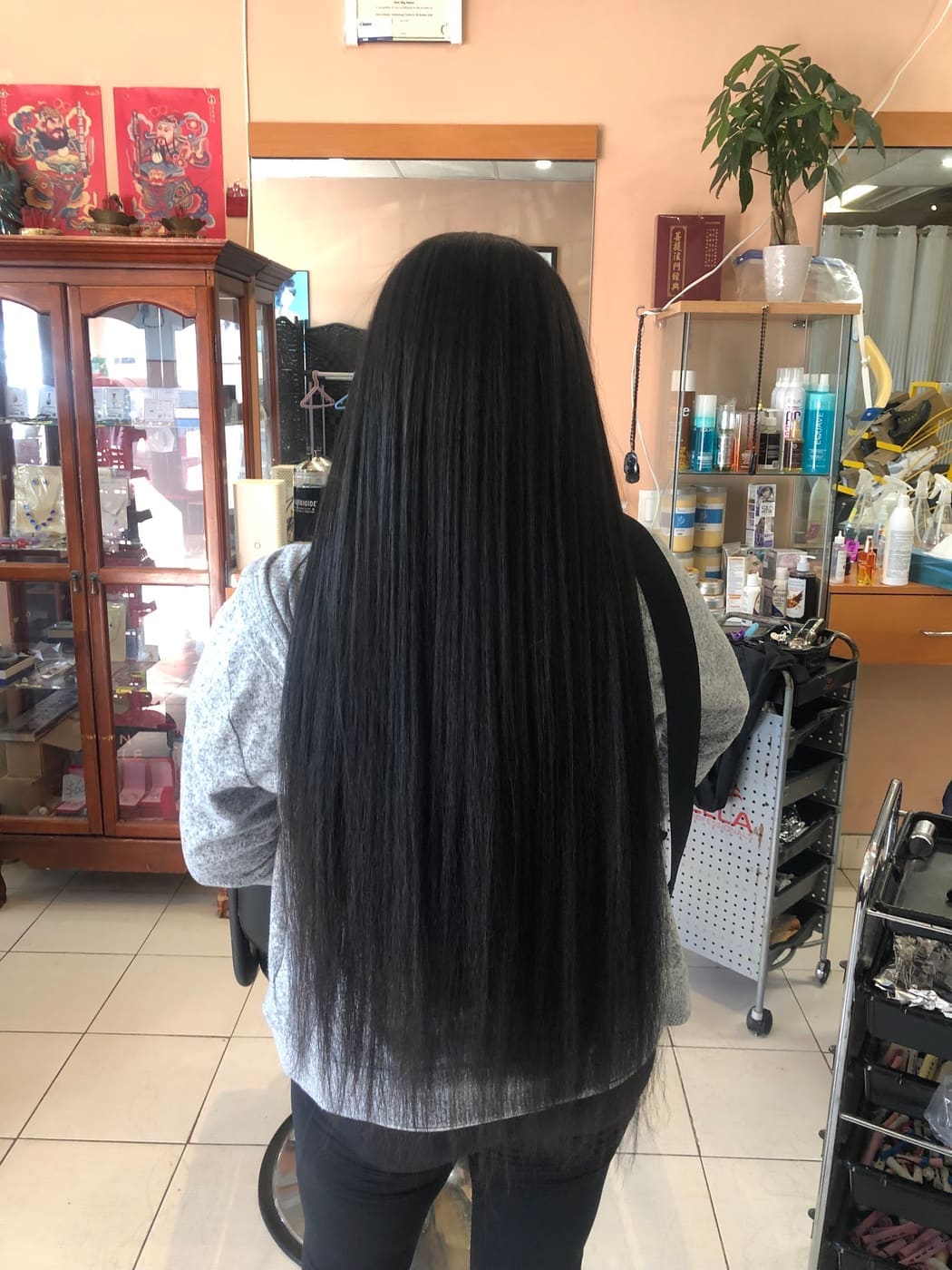 Long straight hair styling result, in-salon