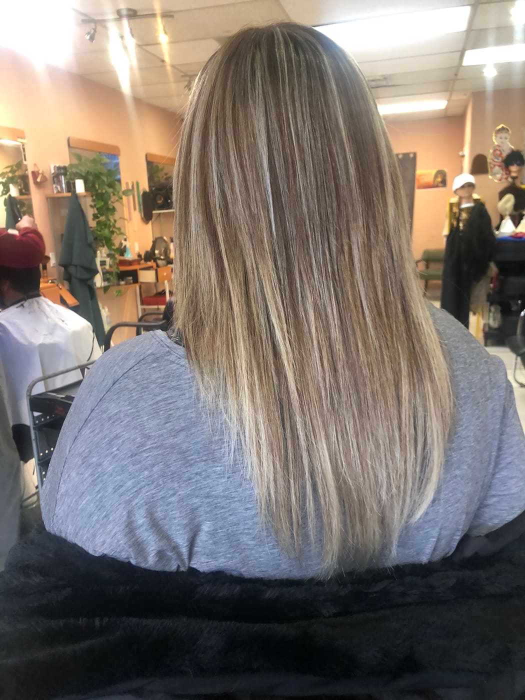Silver-blonde colour on long hair, back view